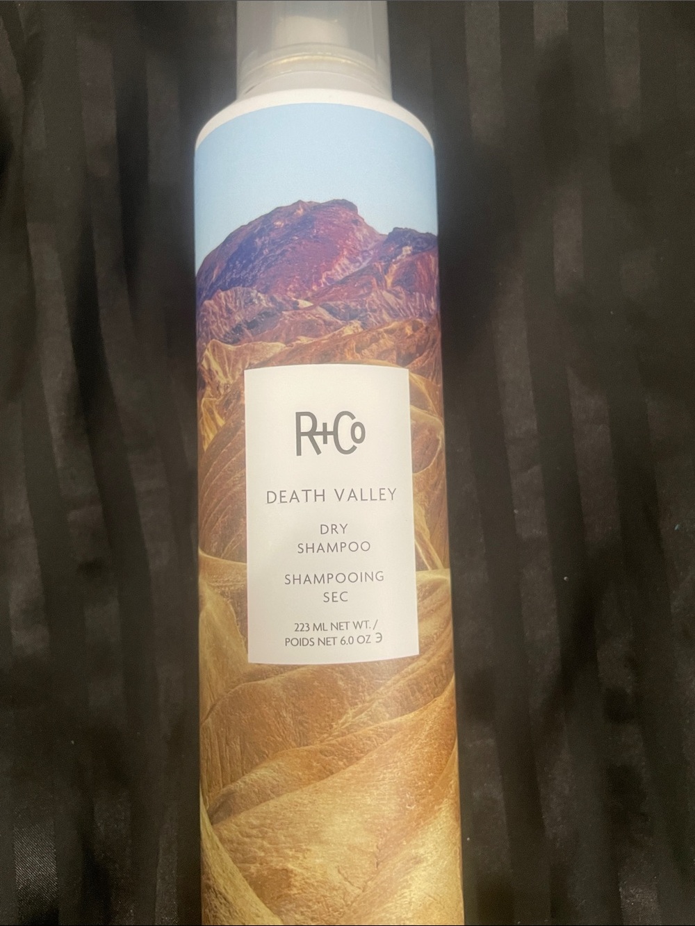 R+Co Death Valley Dry Shampoo - Light Blue & Gold Mountain Graphics